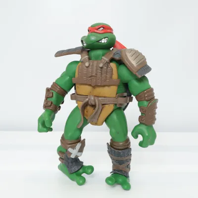 Leksaksfigur (Grön, Brun) från Mirage Studios