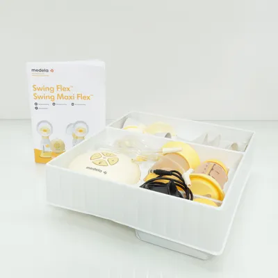 Bröstpump (Gul, Vit, Grå) från Medela