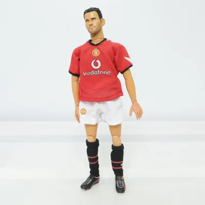 Toy figurine (Red, White, Black) from Revell