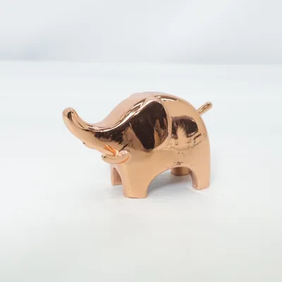 Figurine en porcelaine (Marron) de Umbra