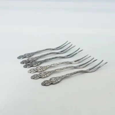 Starter cutlery (NYSILVER , små  vackra plock gafflar I nysilver) from Nilsjohan Nickel silver