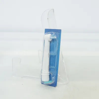 Toothbrush head (White) from Oral-B