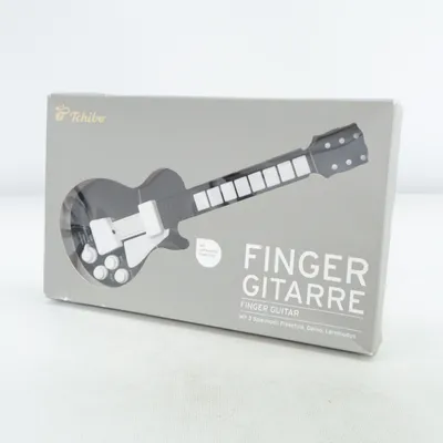 Spielzeuginstrument (Finger Guitar) von Tchibo
