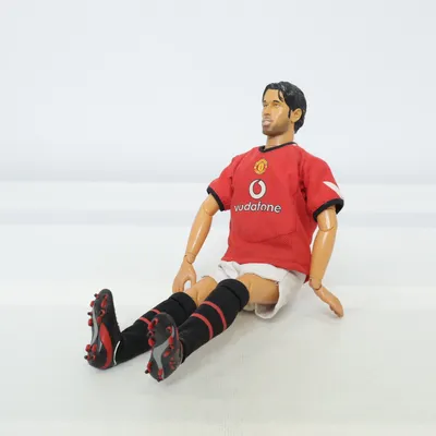 Toy figurine (Red, White, Black) from Revell