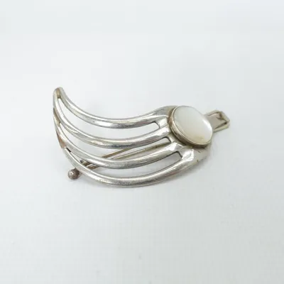 Broche (Argent) Métal inconnu
