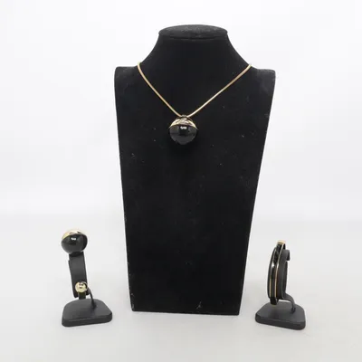 Parure de bijoux (Or, Noir) de Ioaku Métal inconnu