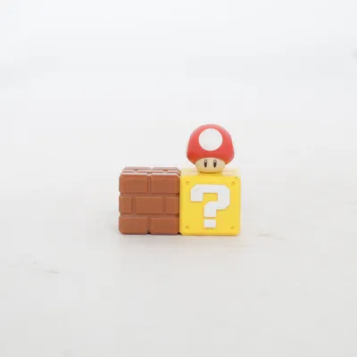 Toy figurine (Brown, Yellow, Red) from Nintendo
