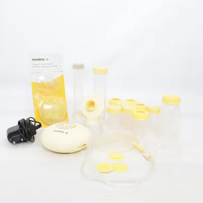 Bröstpump (Transparent, Gul) från Medela