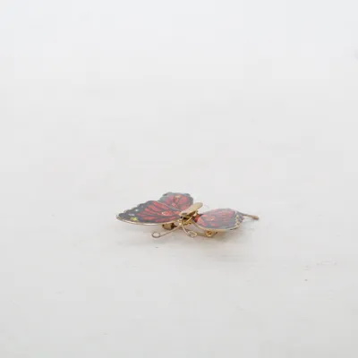 Broche (Rouge, Noir, Or) Métal inconnu