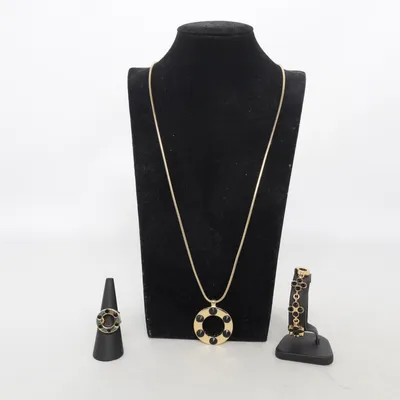 Parure de bijoux (Or, Noir) de Ioaku Métal inconnu