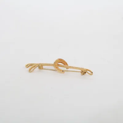 Broche (Or) Métal inconnu