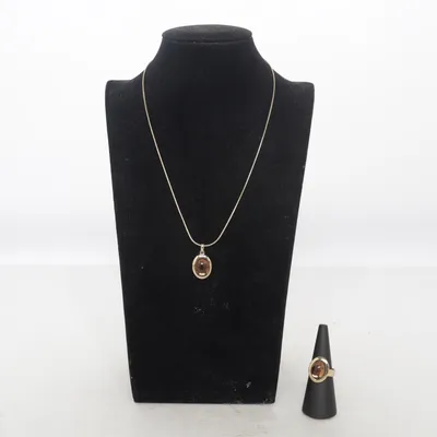 Parure de bijoux (Or, Marron) Métal inconnu