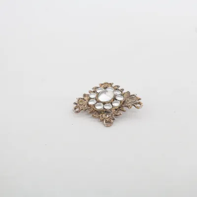 Broche (Or) Métal inconnu