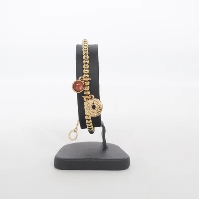 Armband (Guldfärgad) från Q Okänd metall