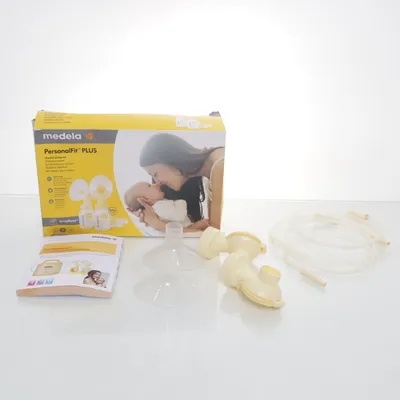 Bröstpump (Vit, Beige) från Medela
