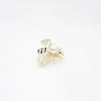 Broche (Goud, Wit, Zwart) Onbekend materiaal