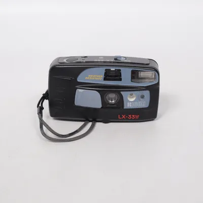 Analog kompaktkamera (LX-33W) från Ricoh