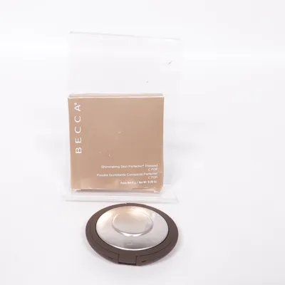 Highlighter (Shimmering Skin Perfector Pressed) från Becca
