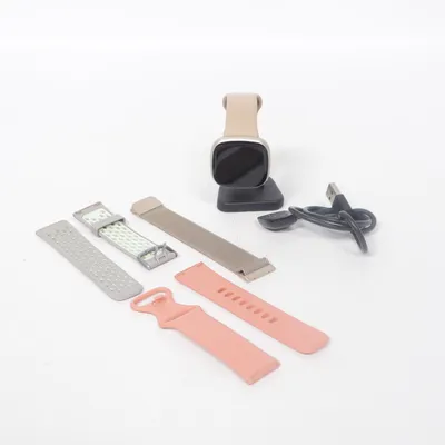 Smartwatch (Beige, Rosa, Grå) från FitBit