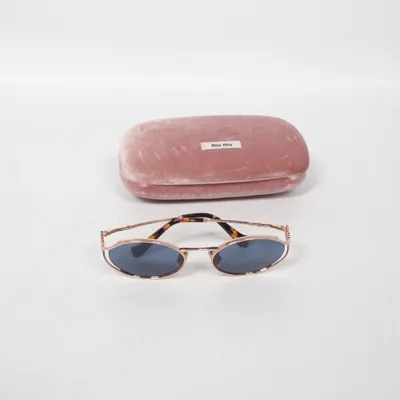 Sunglasses (SMU 52Y) from Miu Miu