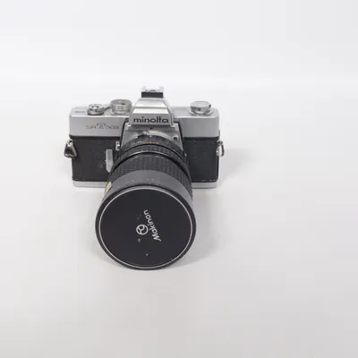 Analog systemkamera (Srt 303 . 1:35 F=35-105mm 771761 72) från Minolta