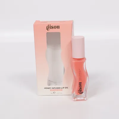 Lip gloss (Honey Infused Lip Oil, Bee-llini Peach) fra Gisou