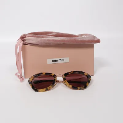 Solglasögon (SMU10N) från Miu Miu