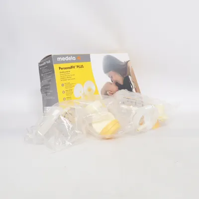 Bröstpump (Gul, Transparent) från Medela