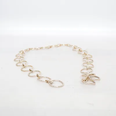 Kroppssmycke (Guldfärgad) Okänd metall