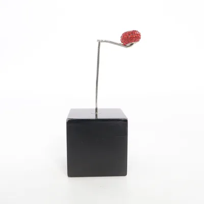 Charm (Red) Unknown metal