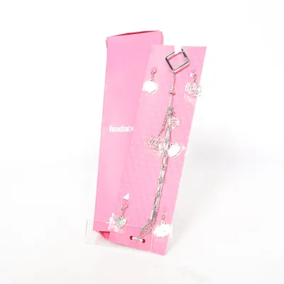 Halsband (Fragrance Holder And Charms) från Huda Beauty Okänd metall