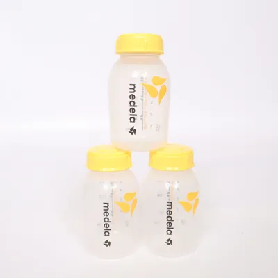 Feeding bottle (White, Yellow) from Medela