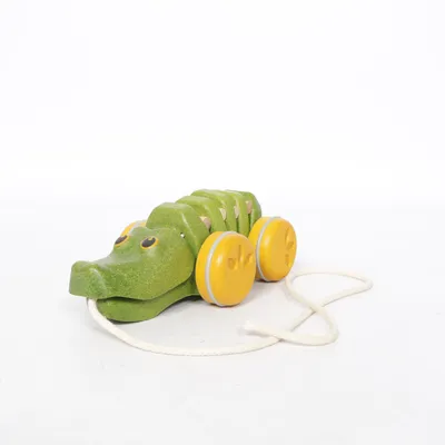 Pull toy (Green, Yellow, Beige) from Plan Toys