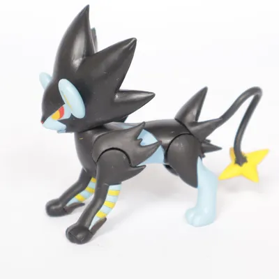 Leksaksfigur (Svart, Blå, Gul) från Pokémon