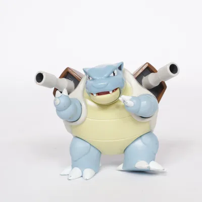 Toy figurine (Blue, Brown, Yellow) from Pokémon