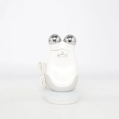 Face massage tool (White, Gray) from Nuface