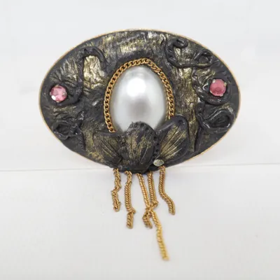 Broche (Or) Métal inconnu