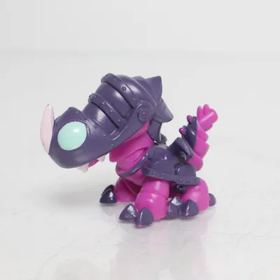 Toy figurine (Purple, Pink, Green) from DWA LLC