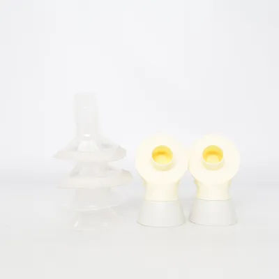 Tire-lait (Transparent, Beige, Gris) de Medela