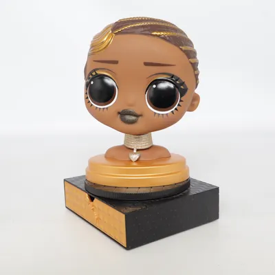 Toy figurine (Brown, Gold, Black) from MGA