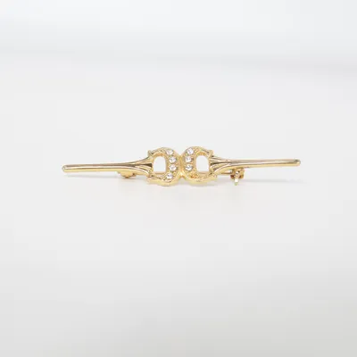 Broche (Or) Métal inconnu