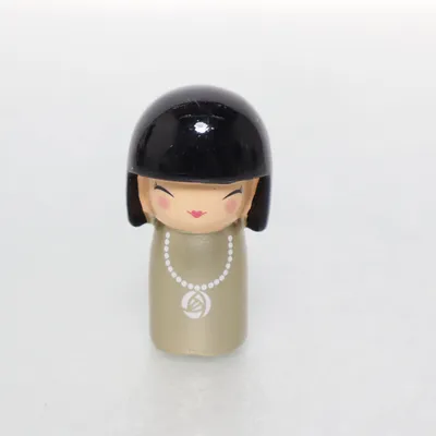 Kokeshi (Guldfärgad, Svart, Flerfärgad) från Skincity