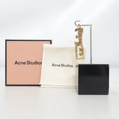 Hänge (Guldfärgad) från Acne Studios Okänd metall