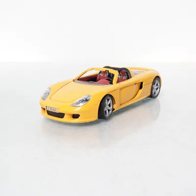 Leksaksbil (Gul, Svart, Röd, Grå) från Carrera