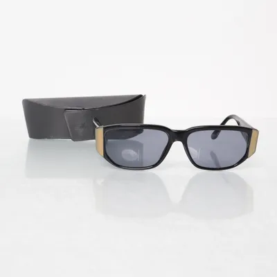 Solglasögon (Svart, Guldfärgad) från Courrèges