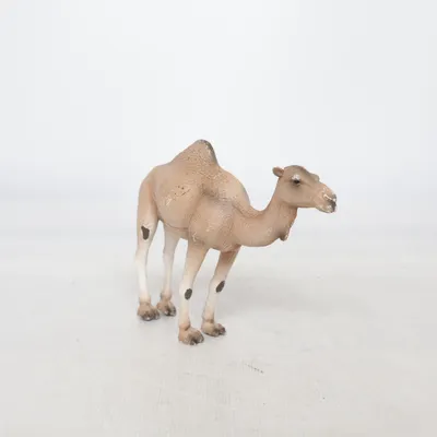 Beeldje (Bruin) van Mojo