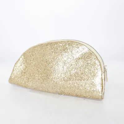 Trousse à maquillage (Or) de Tarte