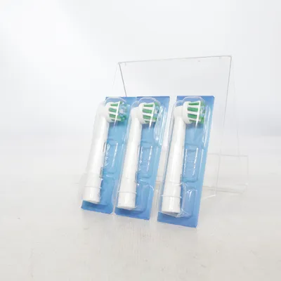 Toothbrush head (White, Green) from Oral-B