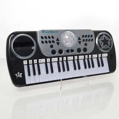 Toy instrument (Black, White) from Lekia AB