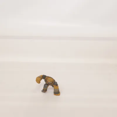 Toy figurine (Brown, Gray) from Gormiti